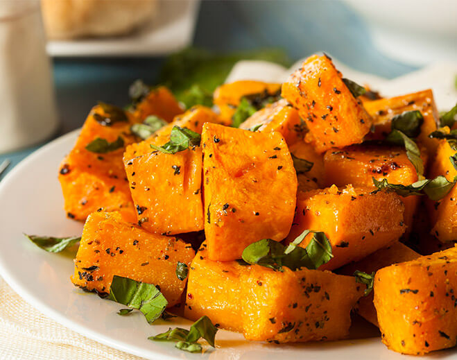 Calabaza asada condimentada en plato