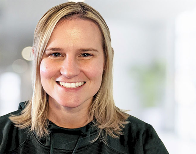 Professional headshot portrait with neutral background