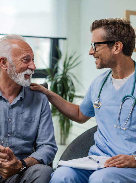 Doctor comforting patient during discussion
