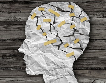 paper cut out of a head