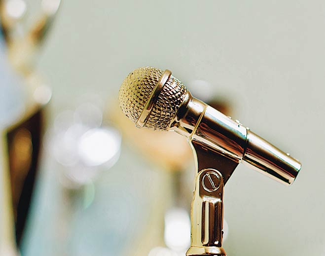 Golden microphone on stand