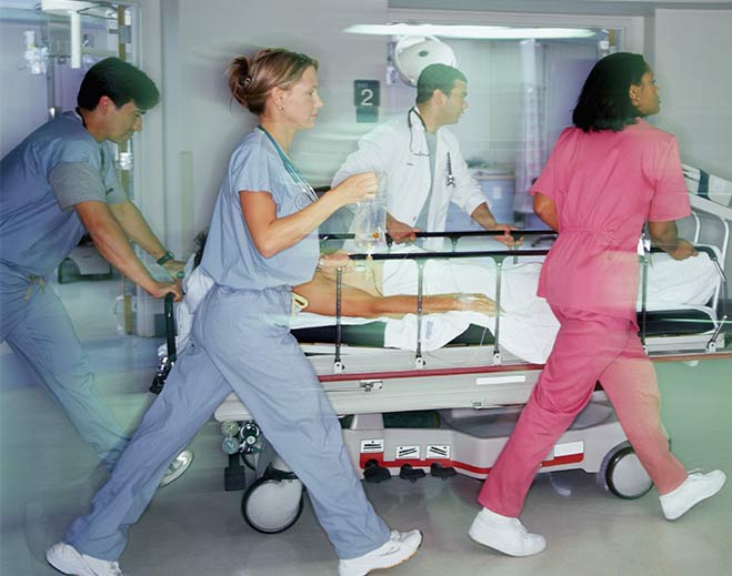 Medical team rushing patient on stretcher