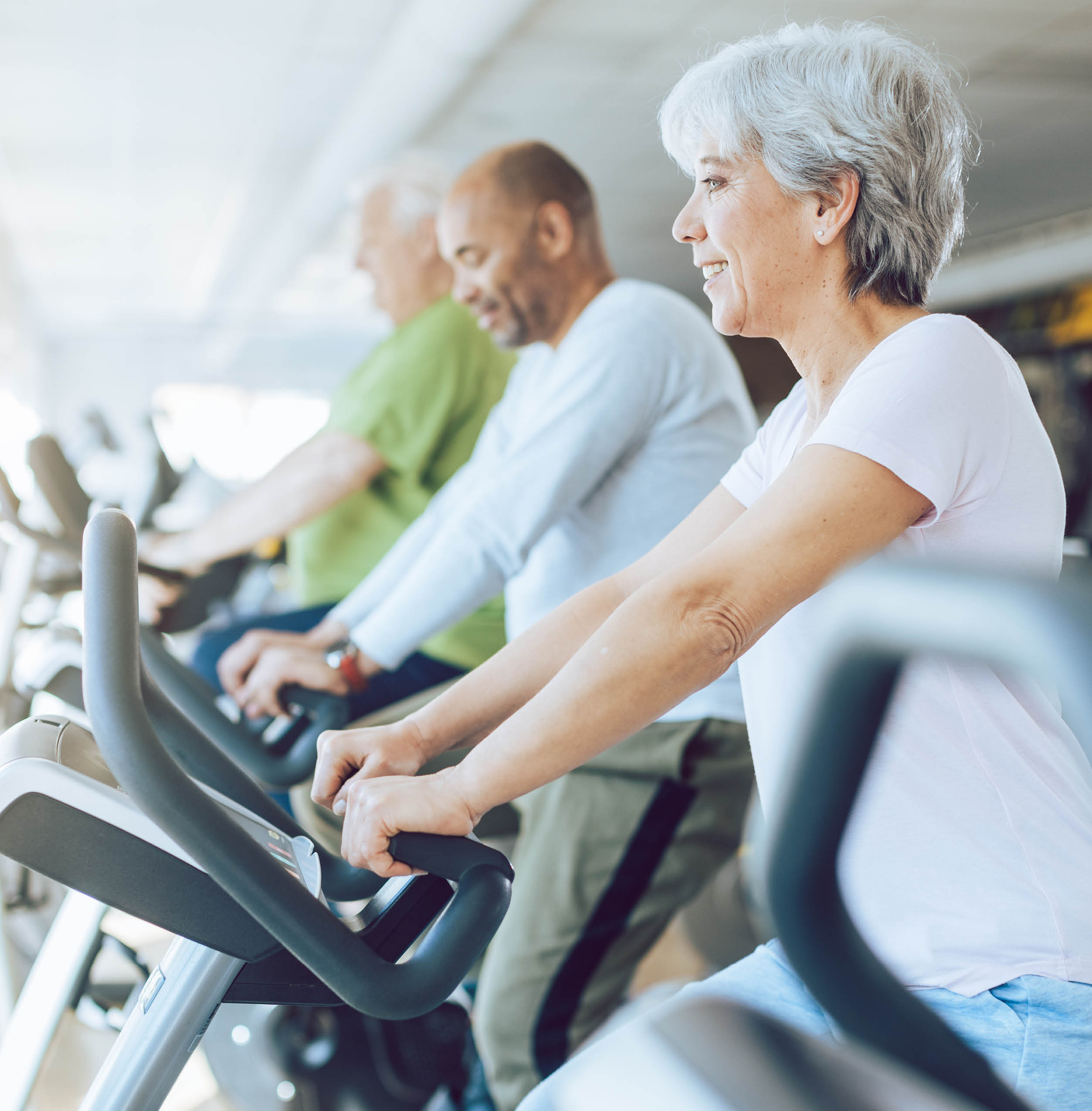 group-of-people-on-workout-bikes group-of-people-on-workout-bikes