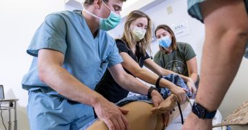 Medical team checking on a patient