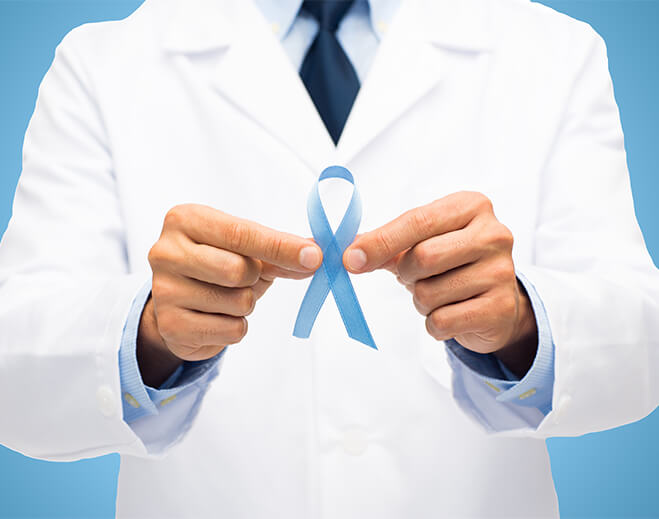 prostate cancer ribbon being held by doc